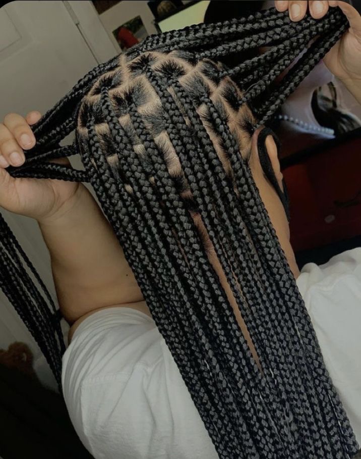 Boho box braids with curled ends