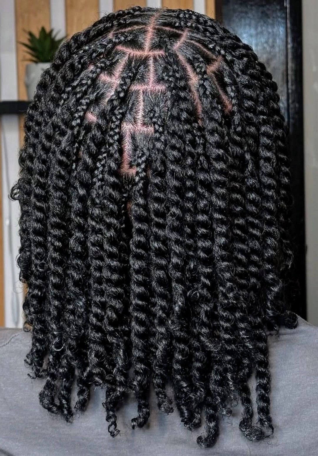 Box braids with curly ends